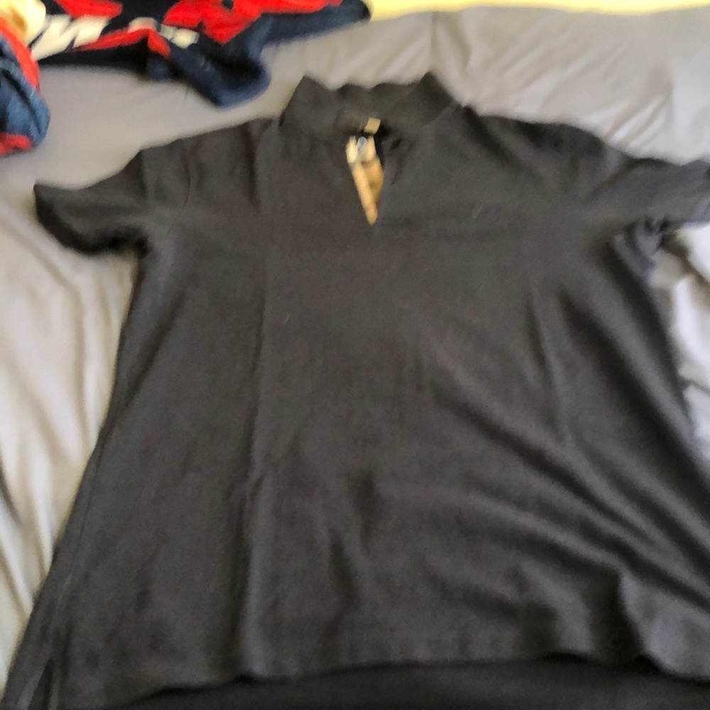 I’m selling a black polo shirt